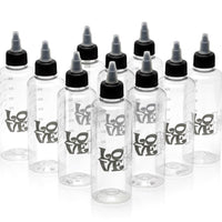 Set of clear bottles with black caps and 'LOVE' text on a white background